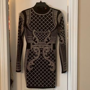 Black bodycon dress with gold round studs